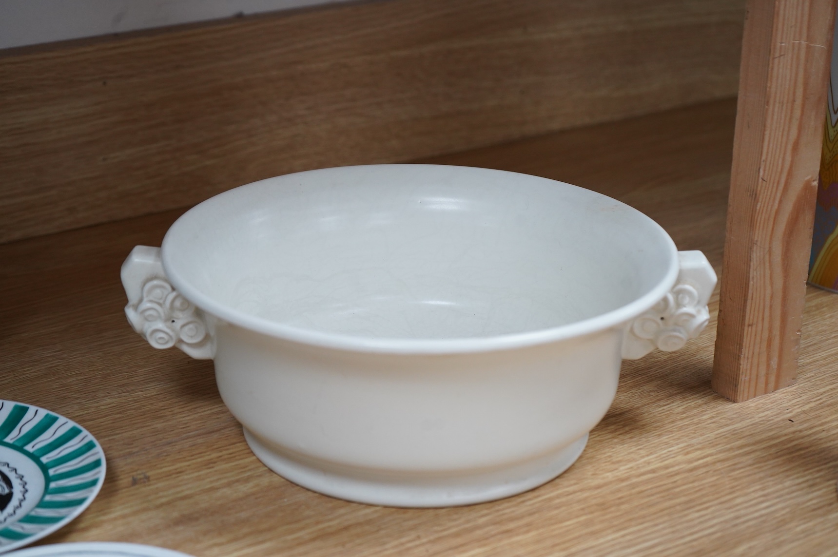 John Adam for Poole pottery, a pair of two branch candelabra and a magnolia white glazed bowl number 672, largest 29cm wide